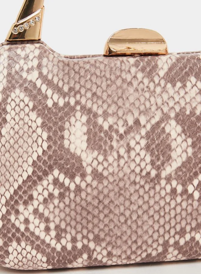 ستايلي شنطة كلاتش بطبعة جلد الثعبان